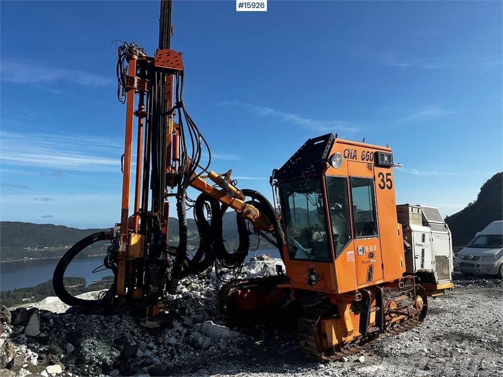 Tamrock CHA 660 Drill Rig. Other drilling equipment