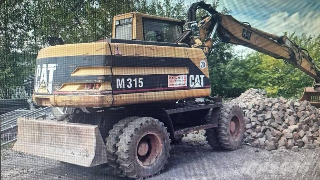 CAT M 315 Mobilbagger