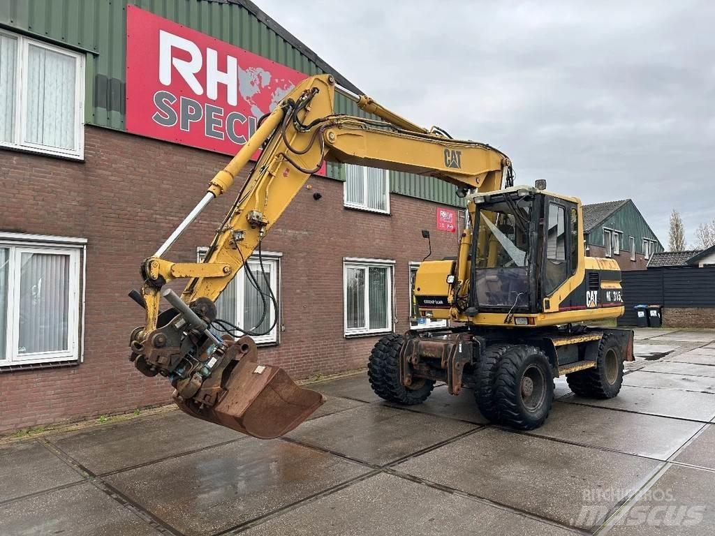 CAT M315 +ROTO CE Mobilbagger