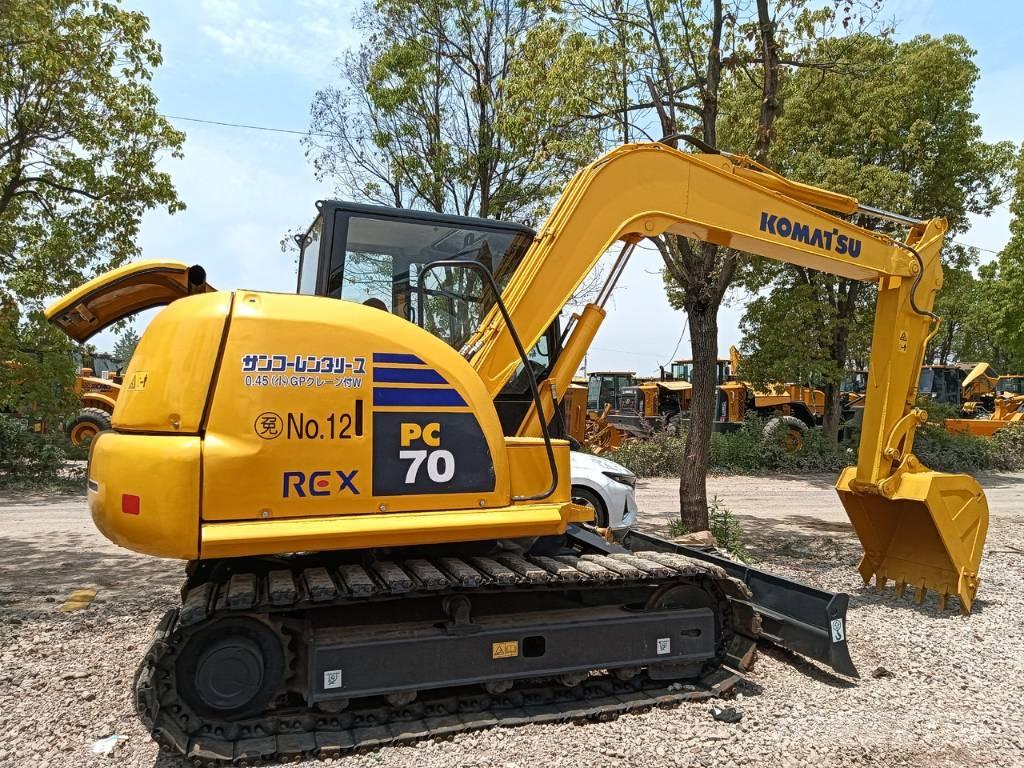 Komatsu PC 70 Midibagger  7t - 12t