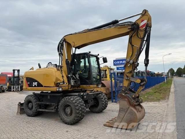 CAT 313D Mobilbagger