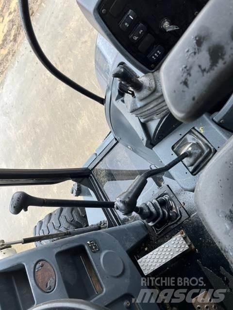 Terex TLB840R Baggerlader