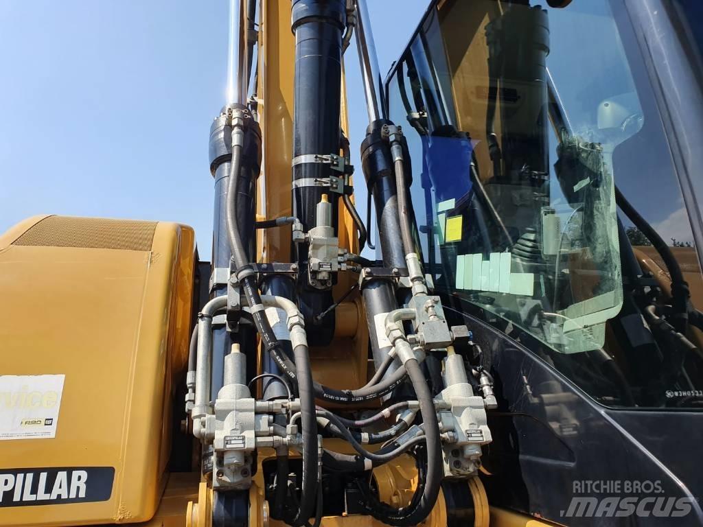 CAT M 313 D Mobilbagger