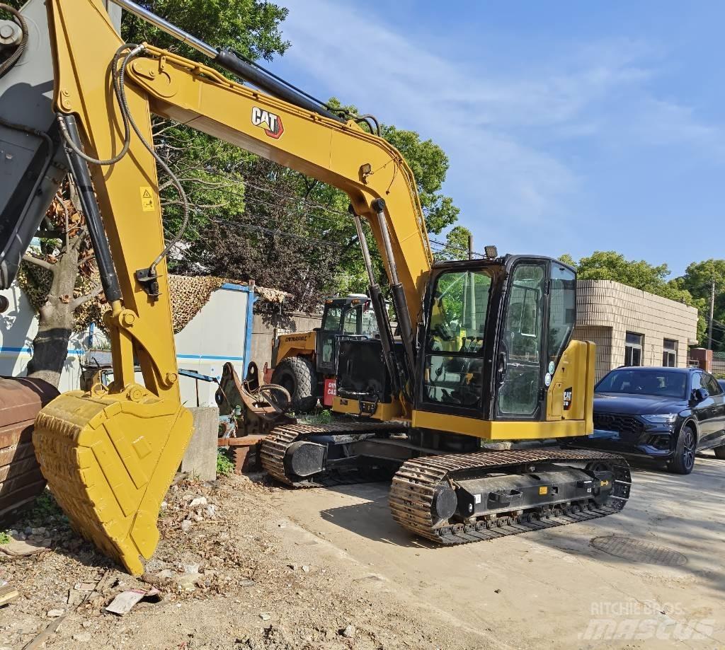 CAT 310 Raupenbagger