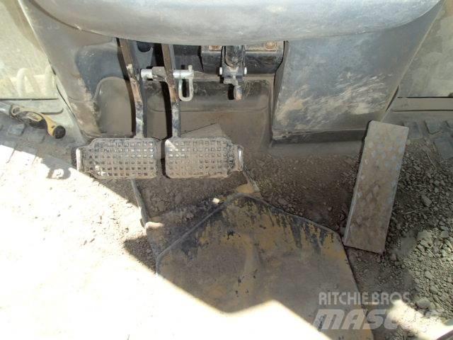 New Holland B 115 B Baggerlader