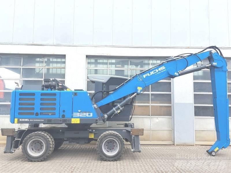 Fuchs MHL 320 F Materialumschlag