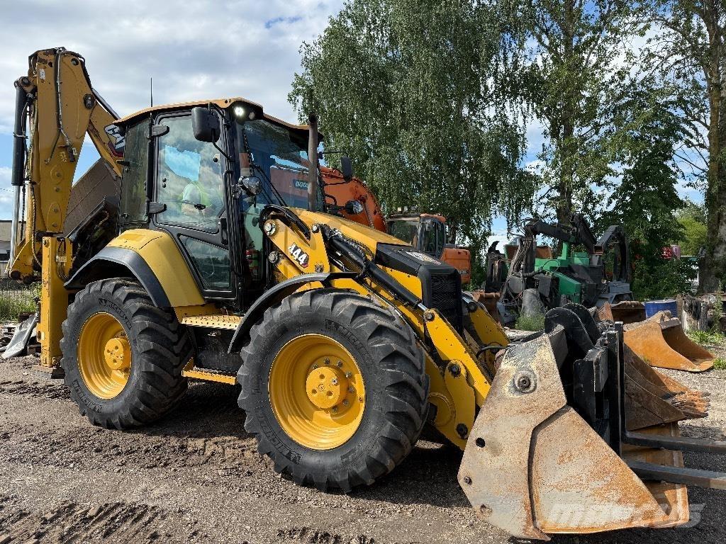 CAT 444 Baggerlader