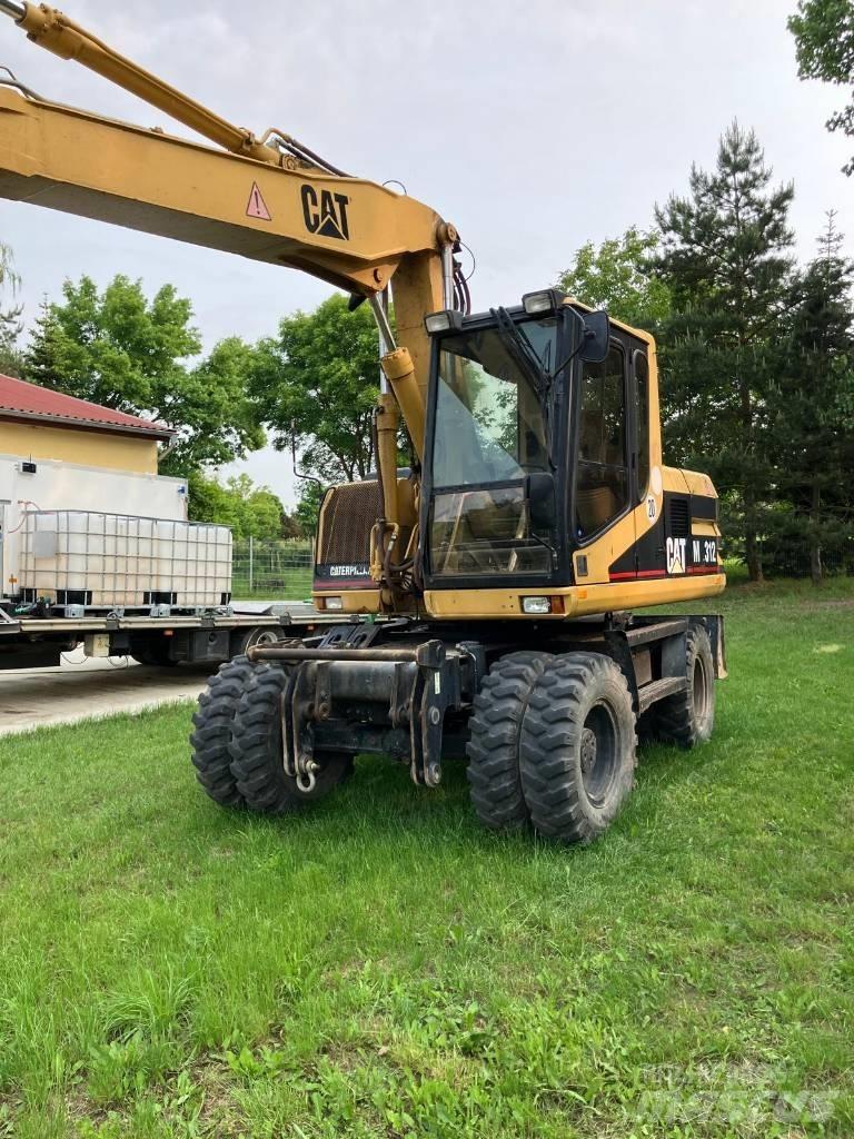 CAT M 312 Mobilbagger