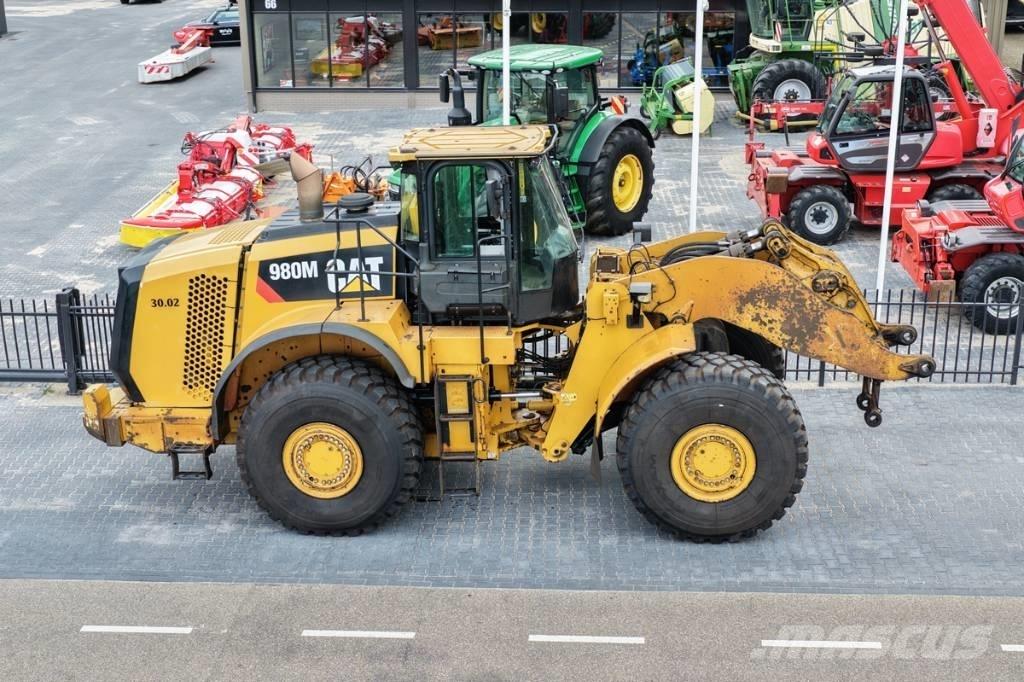 CAT 980M shovel + Bak Radlader