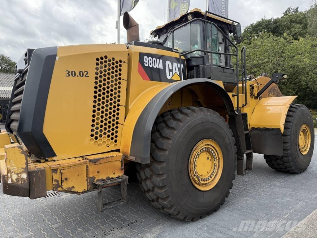 CAT 980M shovel + Bak Radlader