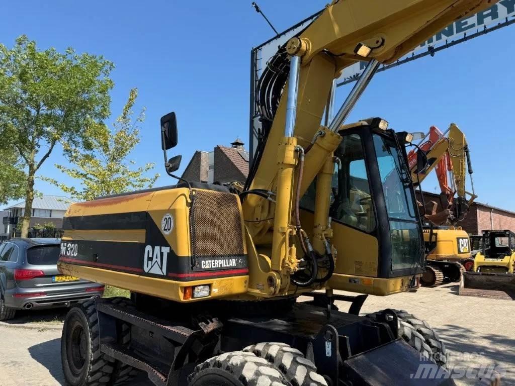 CAT M320 2001 Mobilbagger