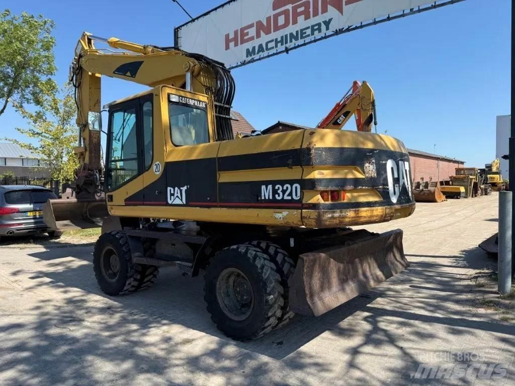 CAT M320 2001 Mobilbagger