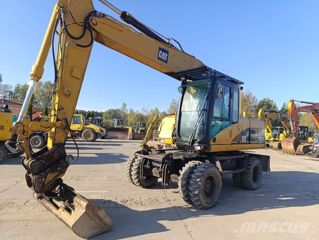 CAT M 318 C Mobilbagger