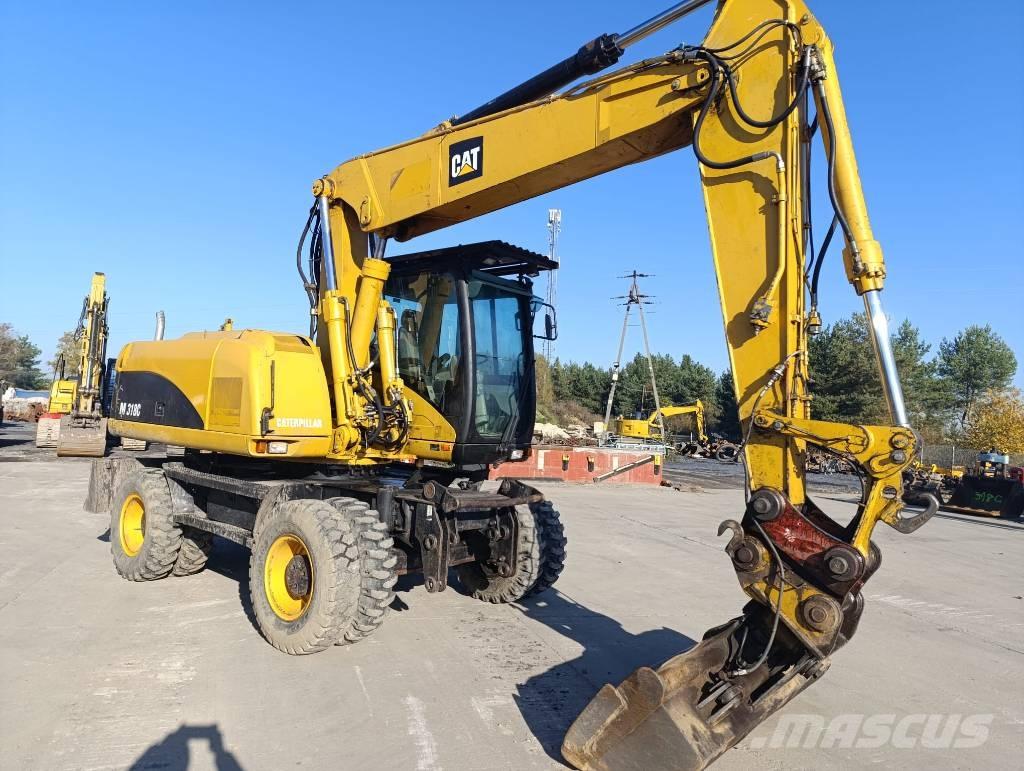 CAT M 318 C Mobilbagger