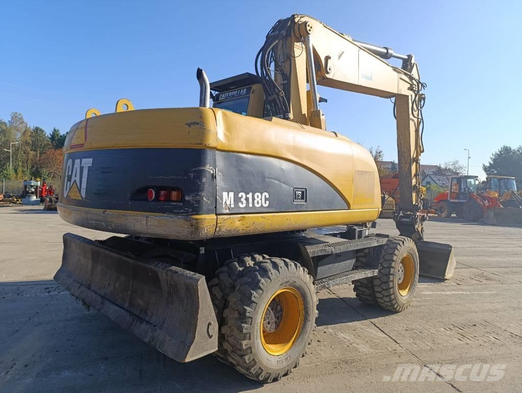 CAT M 318 C Mobilbagger