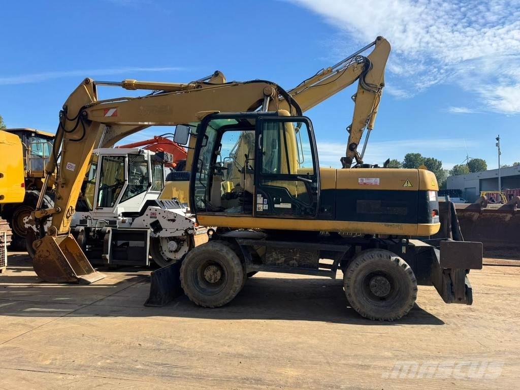 CAT M318C Mobilbagger
