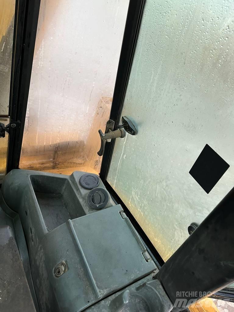 CAT 428D Baggerlader
