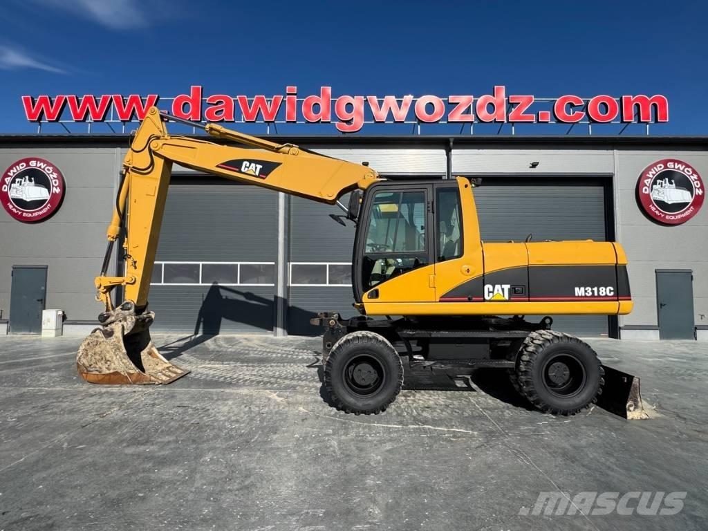 CAT M 318 C Mobilbagger