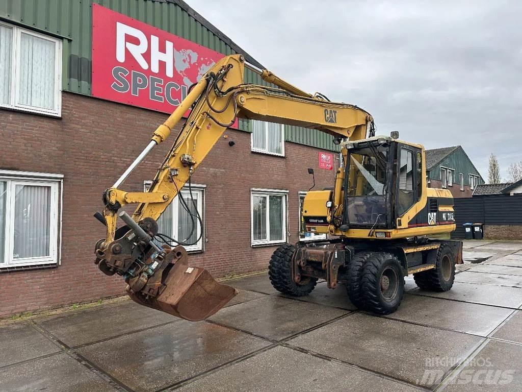 CAT M315 +ROTO CE Mobilbagger