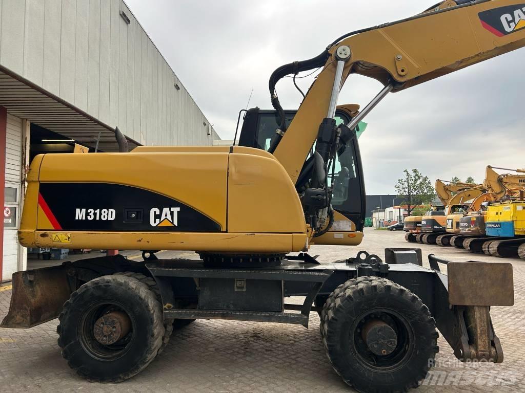 CAT M 318 D Mobilbagger
