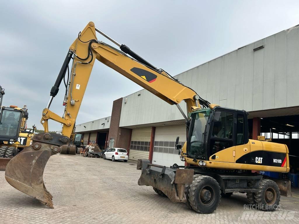 CAT M 318 D Mobilbagger