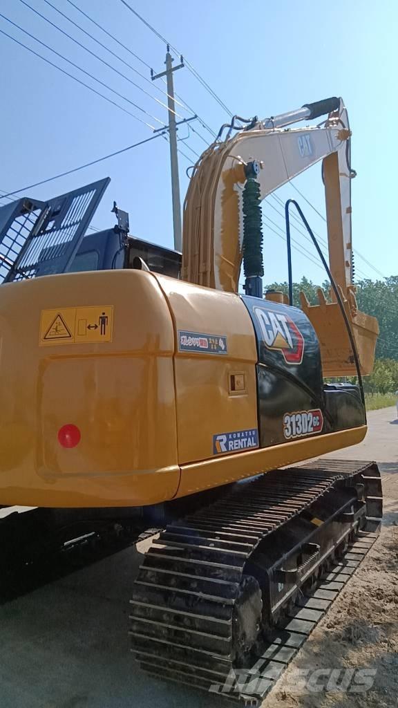 CAT 313 D Mobilbagger