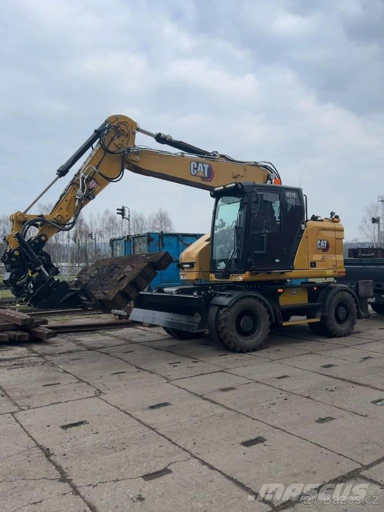 CAT M 319 Mobilbagger