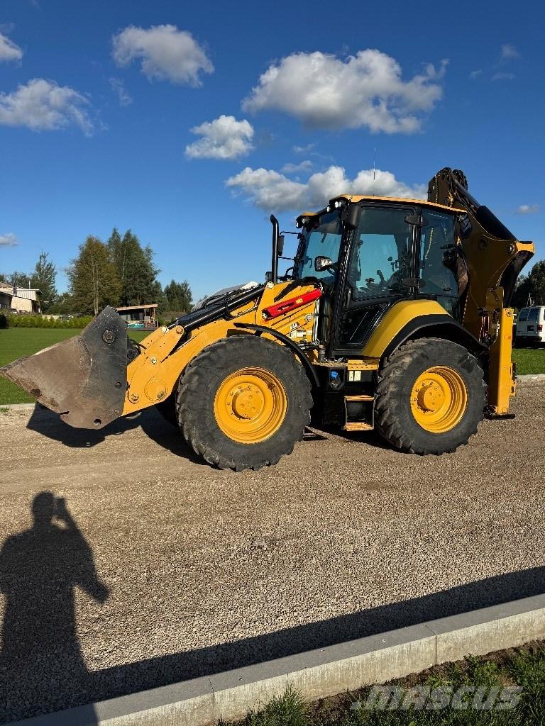 CAT 444 Baggerlader