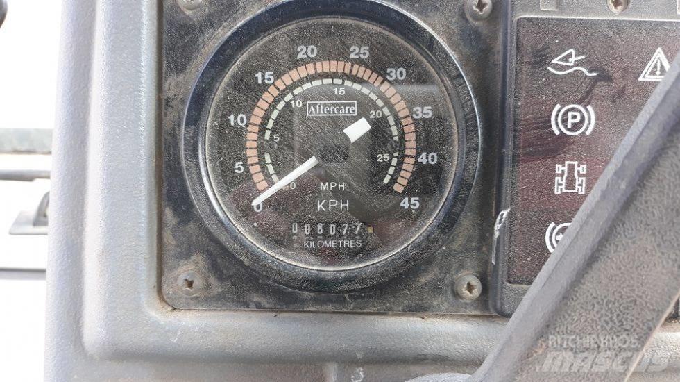 Fermec 860 Baggerlader