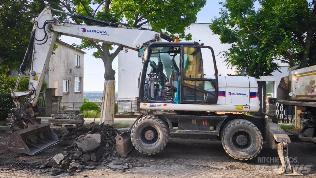 CAT 313 D Mobilbagger