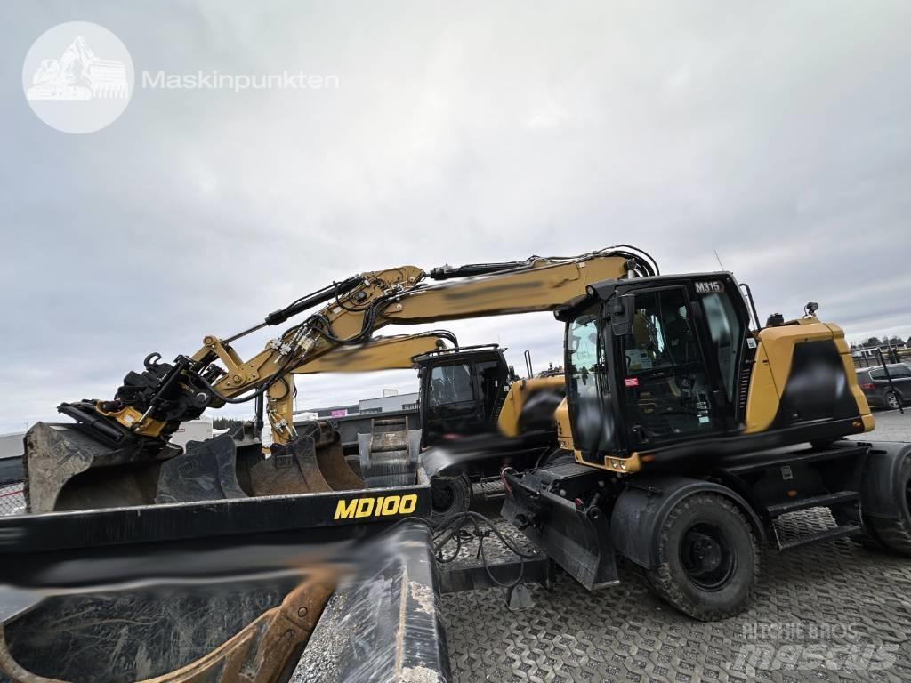 CAT M 315 Mobilbagger