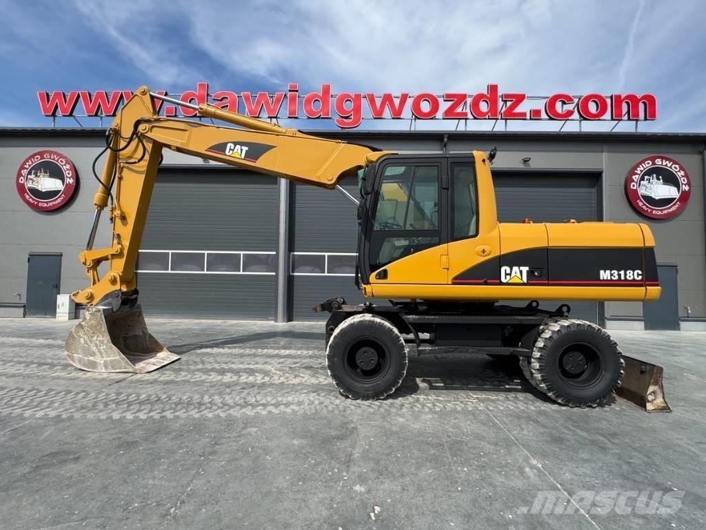 CAT M 318 C Mobilbagger