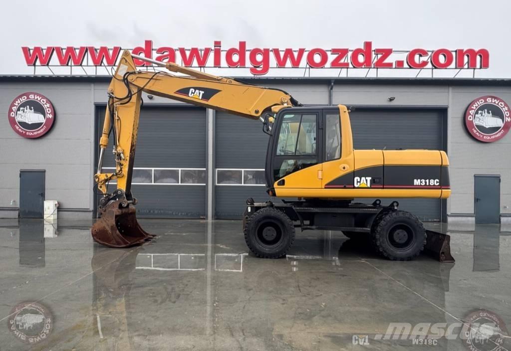CAT M 318 C Mobilbagger