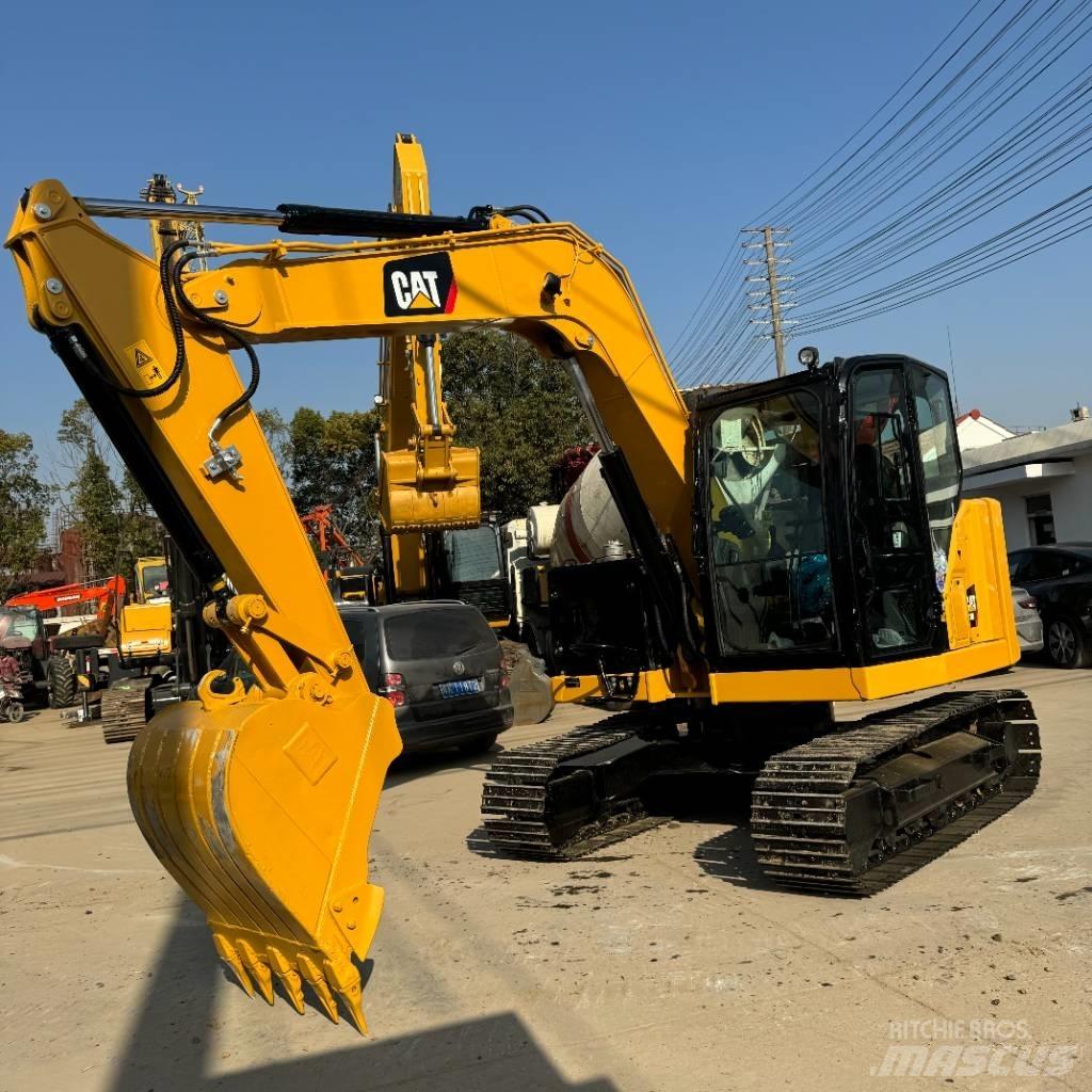CAT 310 Raupenbagger