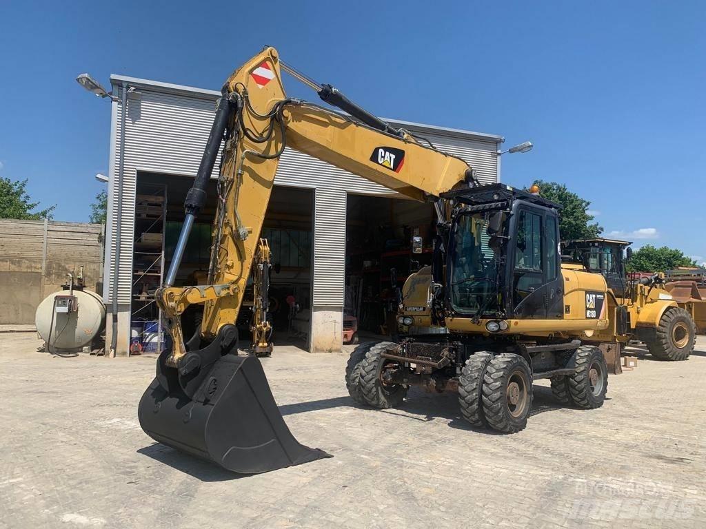 CAT M 318 D Mobilbagger