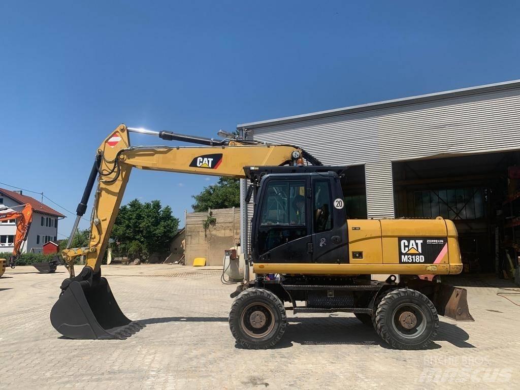 CAT M 318 D Mobilbagger