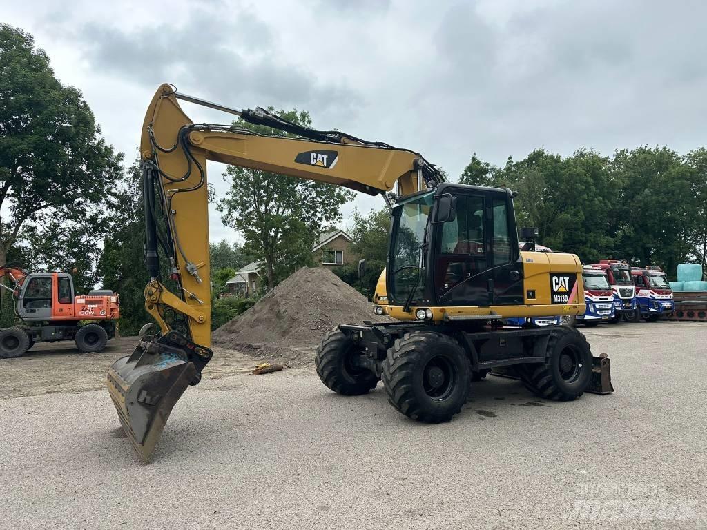 CAT M 313 D Mobilbagger