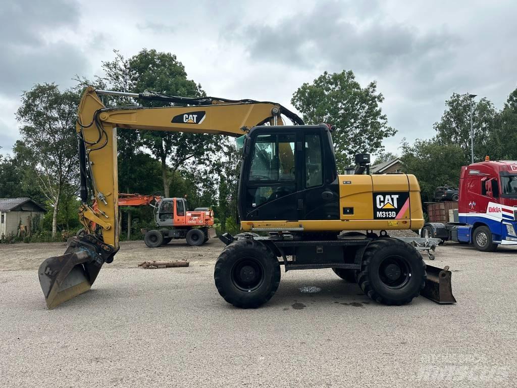 CAT M 313 D Mobilbagger