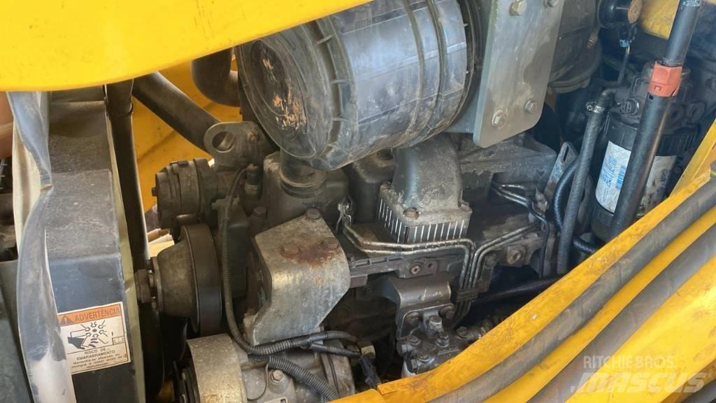 New Holland B 95 B Baggerlader