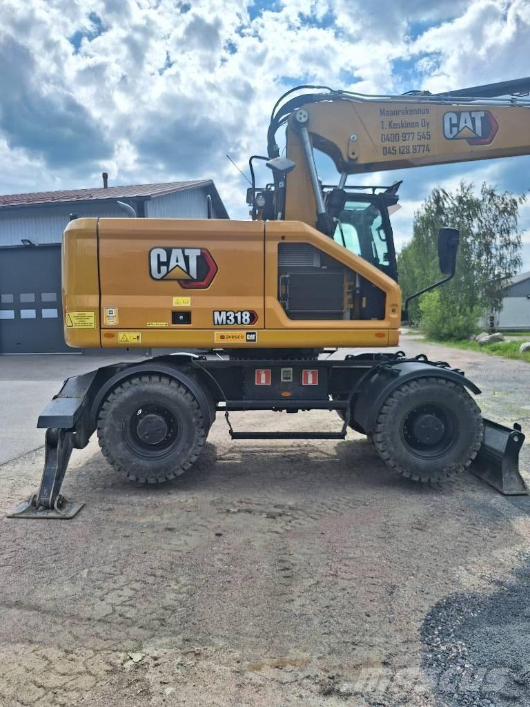 CAT M 318 Mobilbagger