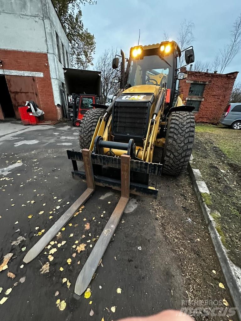 CAT 444F Baggerlader