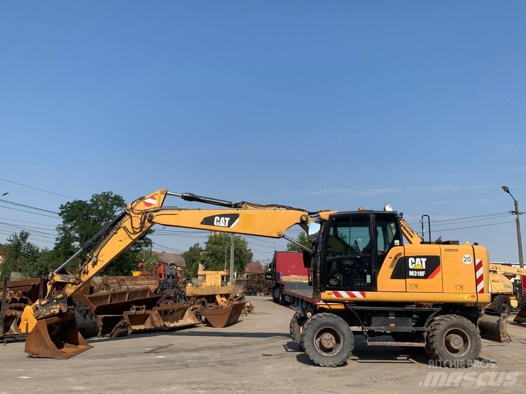CAT M 318 F Mobilbagger