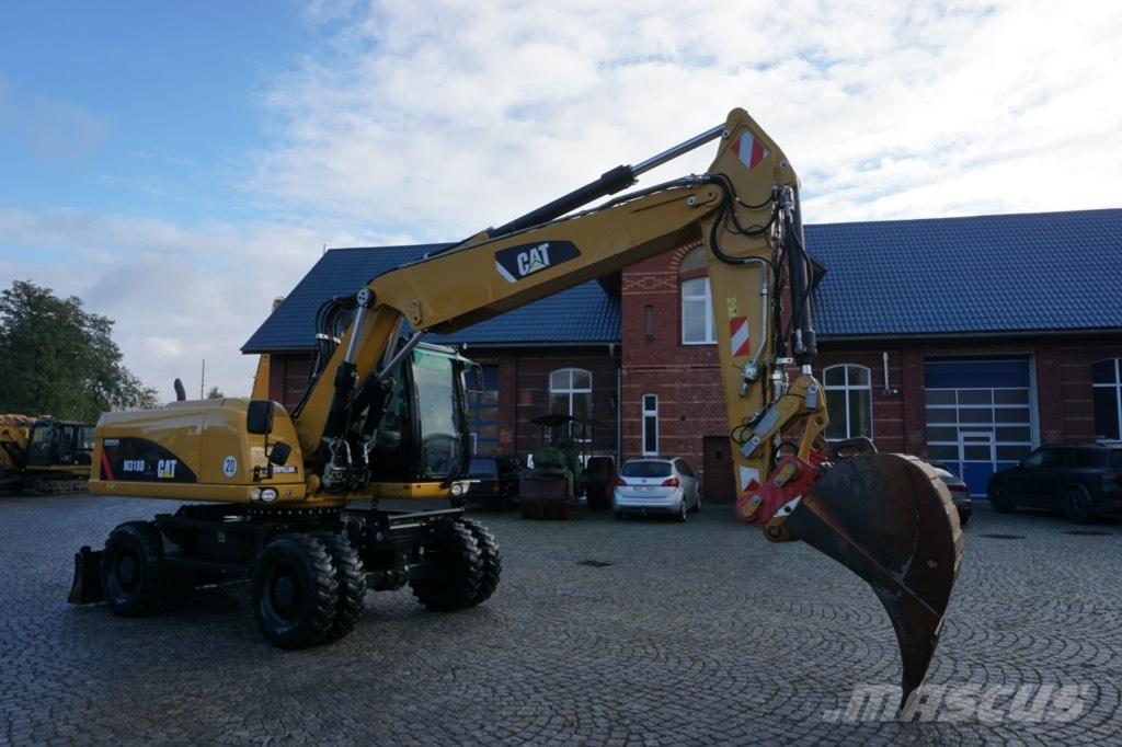CAT M 318 D Mobilbagger