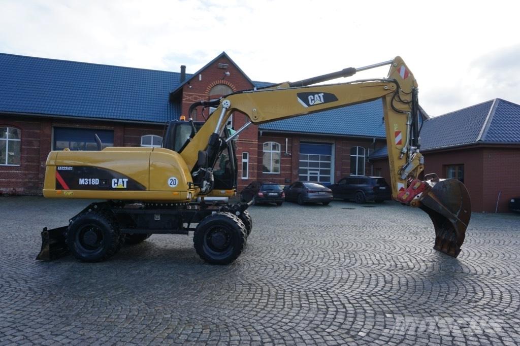 CAT M 318 D Mobilbagger