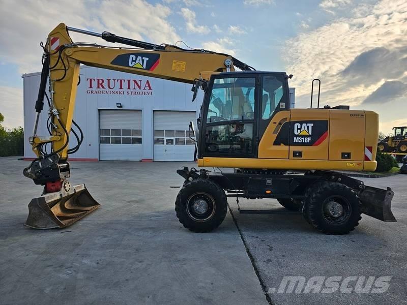 CAT M 318 F Mobilbagger