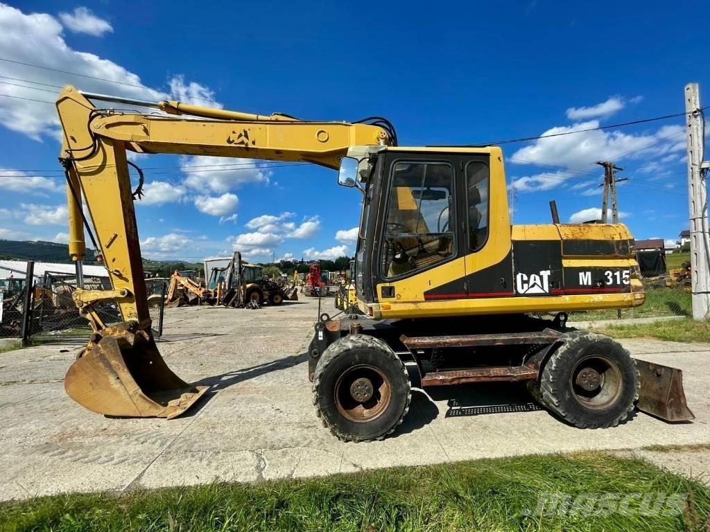 CAT M 315 Mobilbagger