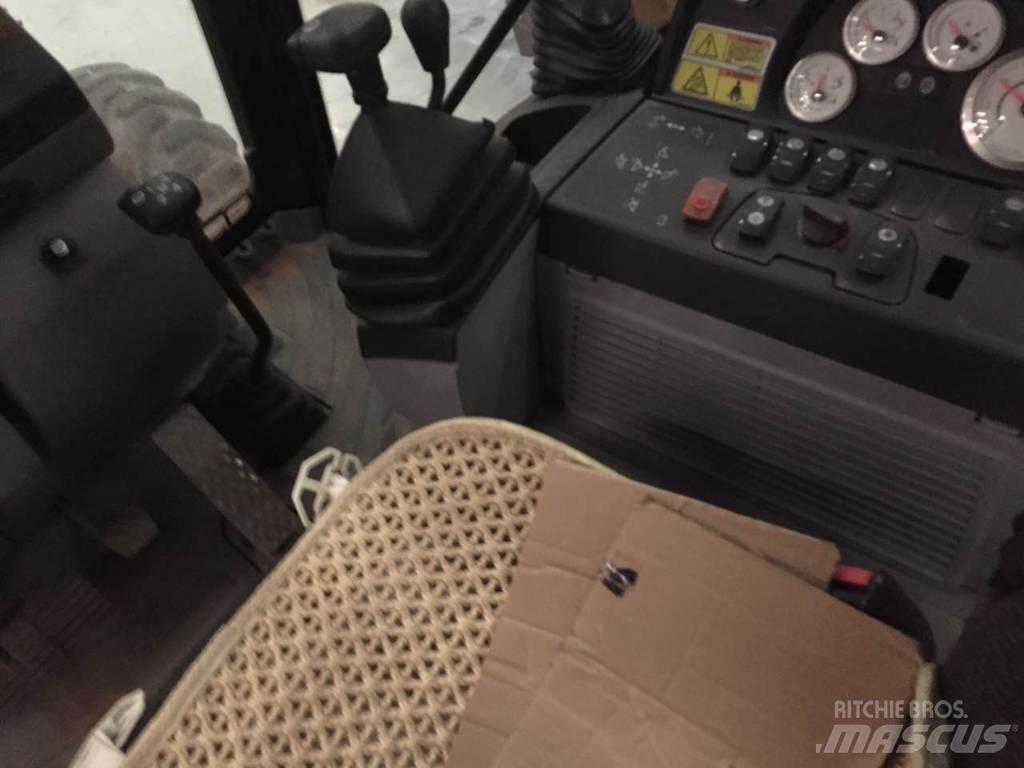 CAT 450 E Baggerlader