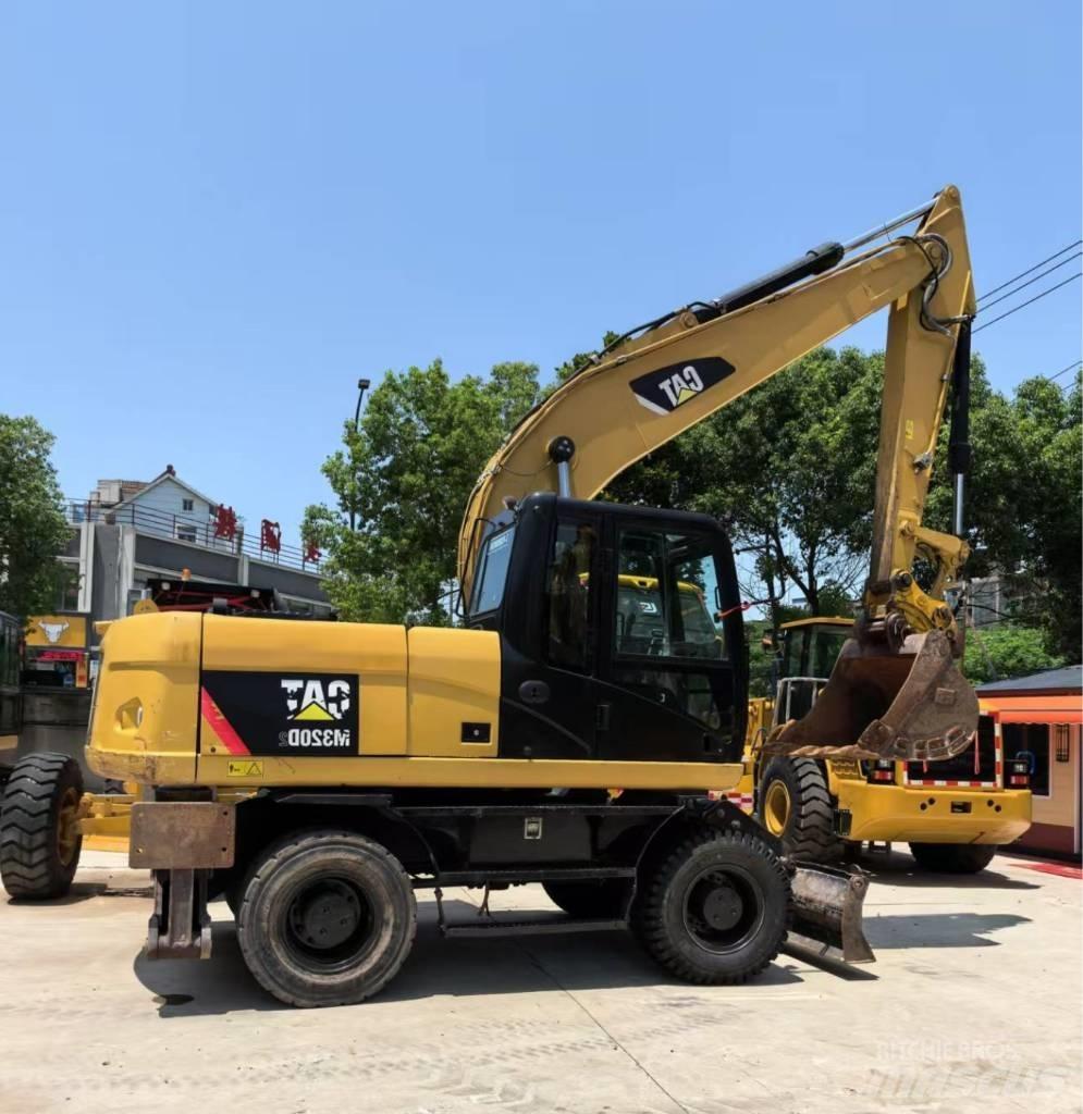 CAT M 320 Mobilbagger