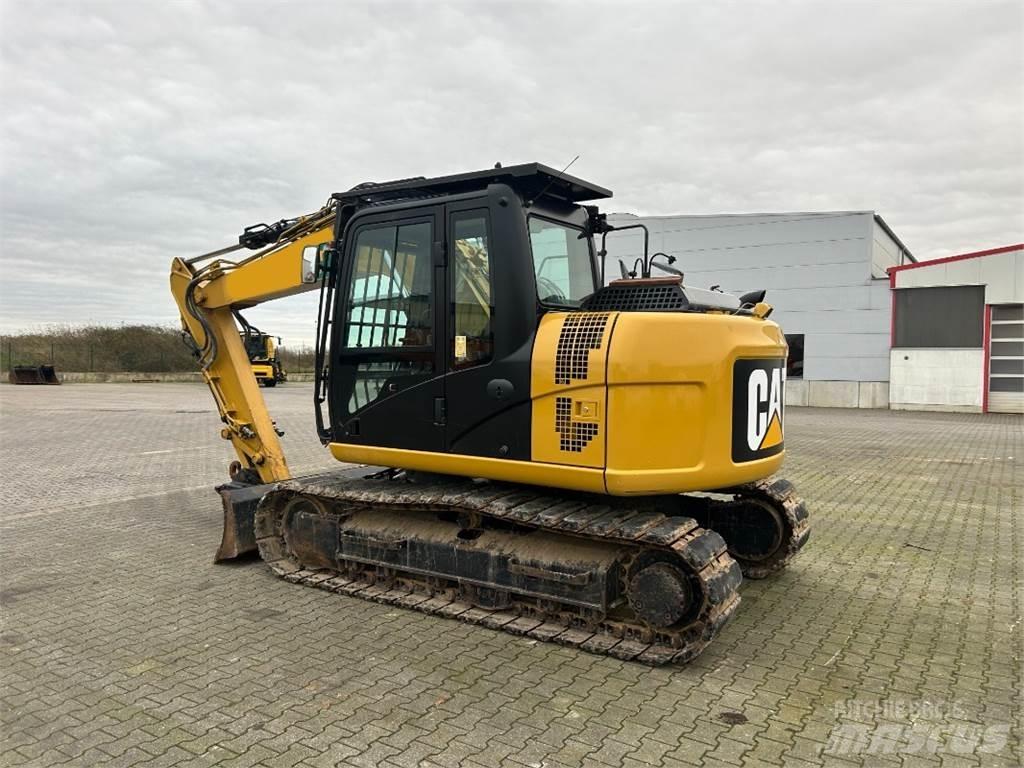 CAT 311 F L RR Mobilbagger