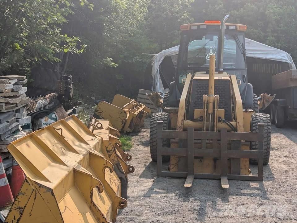 John Deere 310 SE Baggerlader
